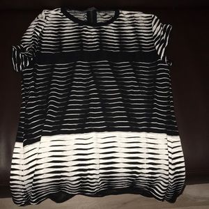 i am selling a black and white shirt.